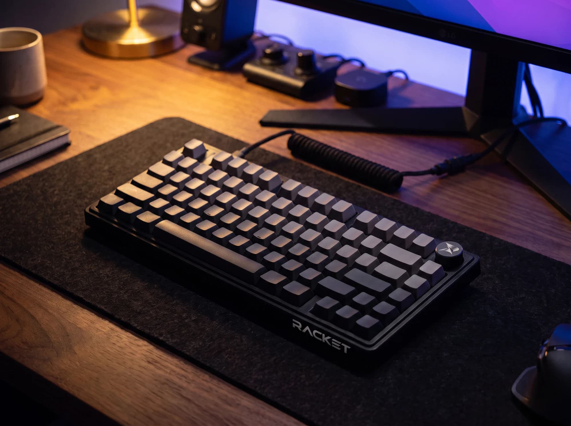 RACKET K75 in Midnight on a desk setup